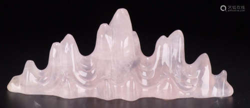 A CRYSTAL MOUNTAIN SHAPED PEN SHELF