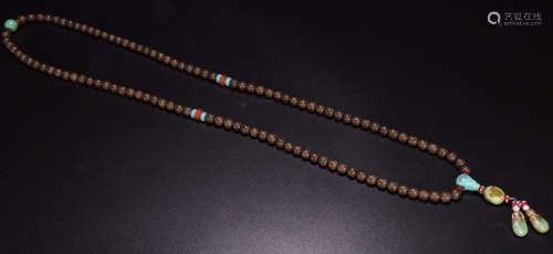 A CHENXIANG WOOD CARVED BEAD STRING NECKLACE