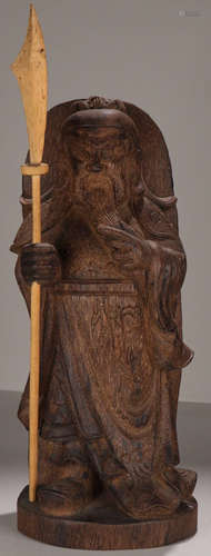 A CHENXIANG WOOD CARVED GUANYU STATUE PENDANT