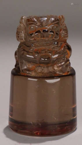 A CRYSTAL LION SHAPED SEAL