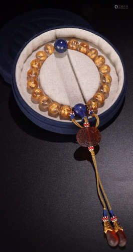 A CRYSTAL BEADS STRING BRACELET