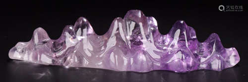 A CRYSTAL MOUNTAIN SHAPED PEN SHELF