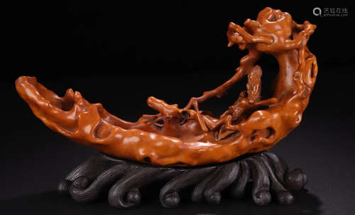 A HUANGYANG WOOD CARVED SHIP SHAPED PENDANT