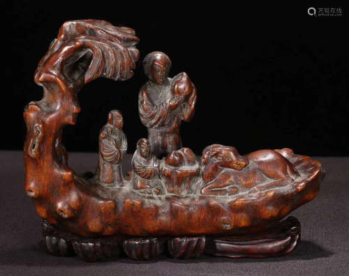 A CHENXIANG WOOD CARVED MUGU SHAPED STATUE