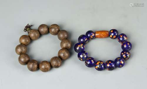 Two Chinese Peking Glass and Chenxiang Bracelets