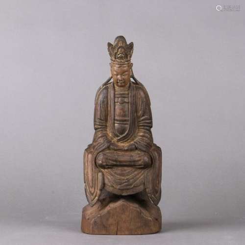 A CHINESE CARVED WOOD FIGURE OF A SEATED BUDDHA