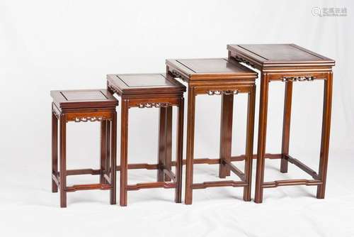 A SET OF FOUR RECTANGULAR WOOD STANDS