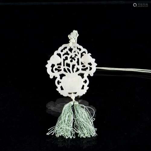 A WHITE JADE 'FLOWER BASKET' PLAQUE