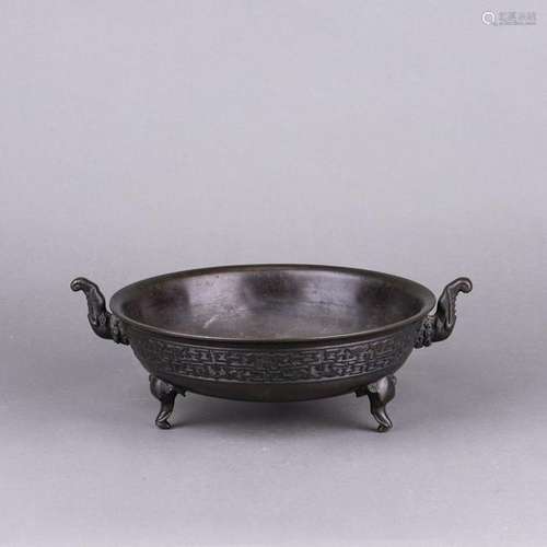 AN UPRIGHT BRONZE TRIPOD CENSER