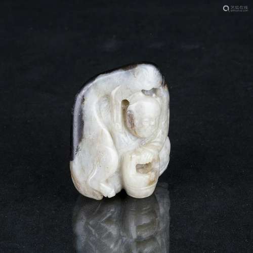 A WHITE JADE CARVING