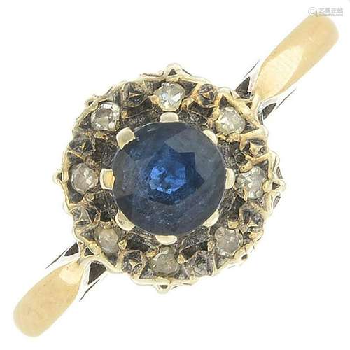 A 9ct gold sapphire and diamond cluster ring.Hallmarks