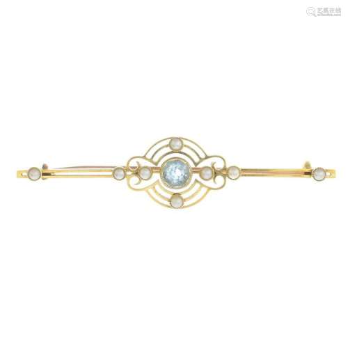 An early 20th century gold aquamarine and split pearl