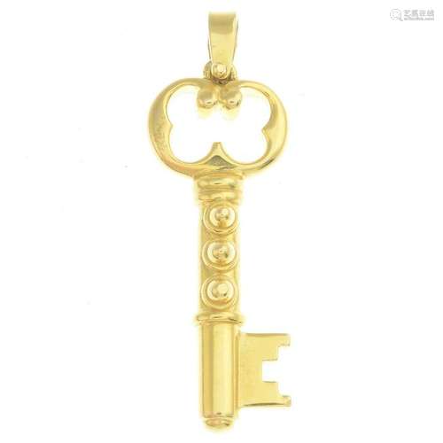 An 18ct gold key pendant, by Temenos.Signed