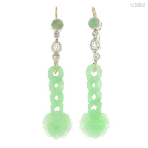 A pair of jade and diamond earrings.With report