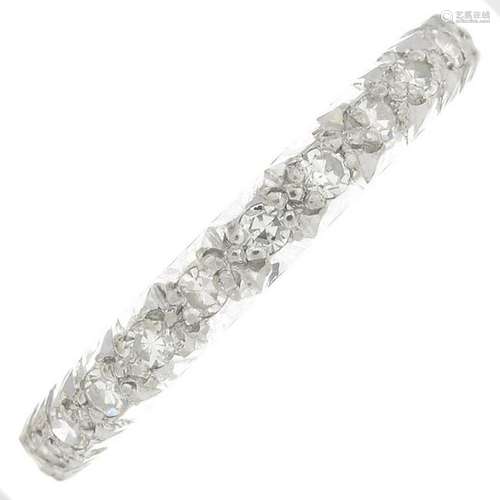 A diamond full eternity ring.Estimated total diamond