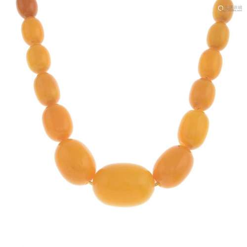 An amber bead necklace with matching earrings.Length of