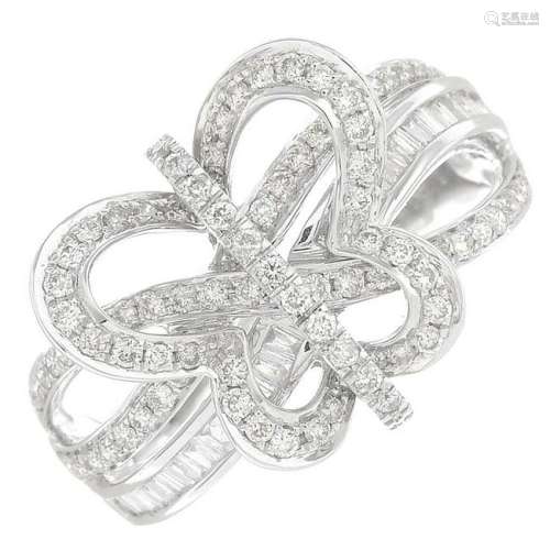 A vari-cut diamond dress ring, designed as a butterfly.
