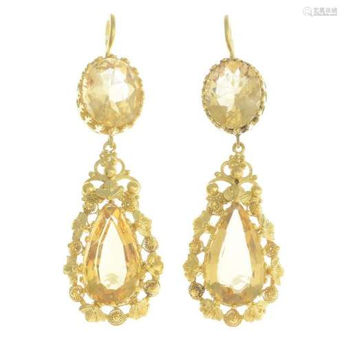 A pair of citrine earrings.Principal citrines