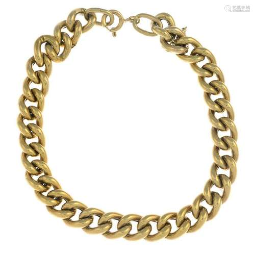 A 1970s 9ct gold curb-link bracelet.Import marks for