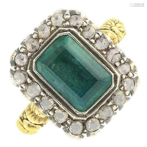 An emerald and diamond cluster ring. Ring size N.