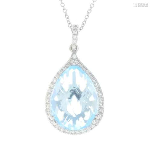 A 9ct gold blue topaz and diamond cluster pendant, with