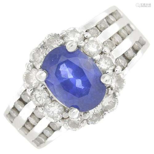 A sapphire and diamond cluster ring.Sapphire calculated