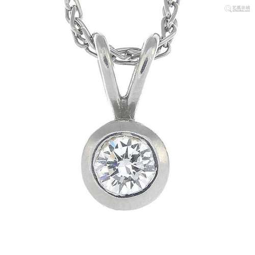 A platinum diamond pendant, suspended from a platinum