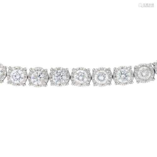 A diamond line bracelet.Total diamond weight 5.71cts,