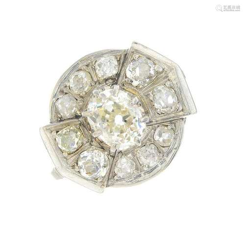 A mid 20th century platinum diamond cluster ring.