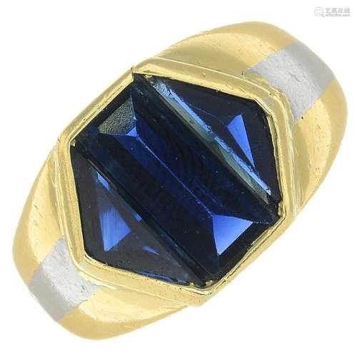 A sapphire three-stone bi-colour signet ring.Principal