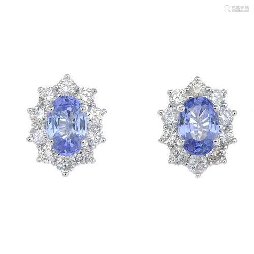 A pair of sapphire and diamond cluster