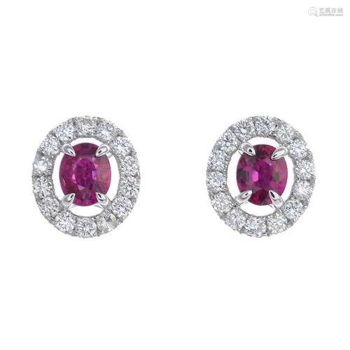 A pair of ruby and diamond cluster earrings.Estimated