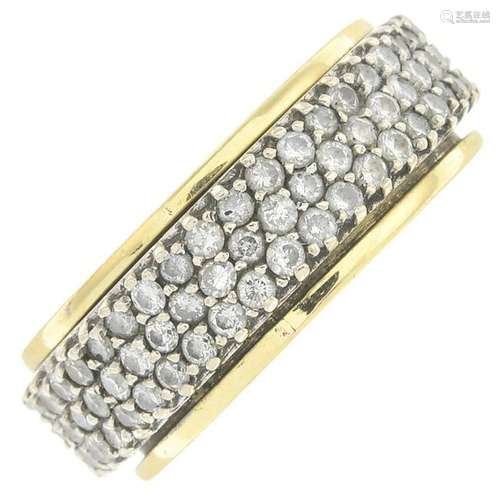 A diamond full eternity spinner ring. Estimated total