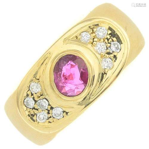 A ruby and diamond ring.Ruby calculated weight 0.30ct,