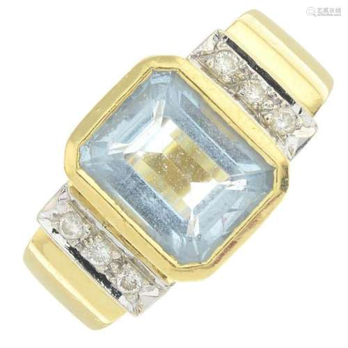 An aquamarine and diamond dress ring. Aquamarine