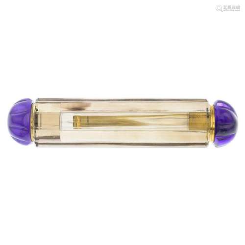 A smoky quartz and amethyst perfume bottle. Length