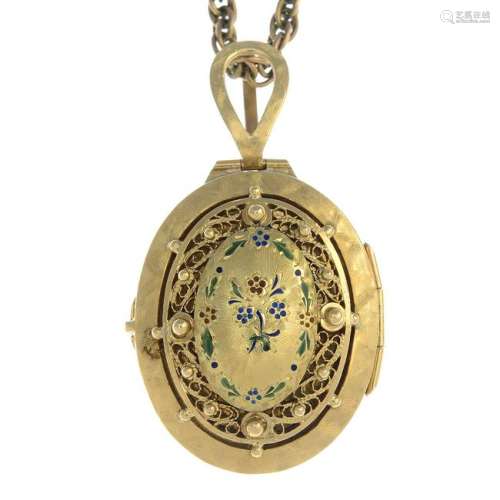 A 14ct gold enamel locket, suspended from a 9ct gold
