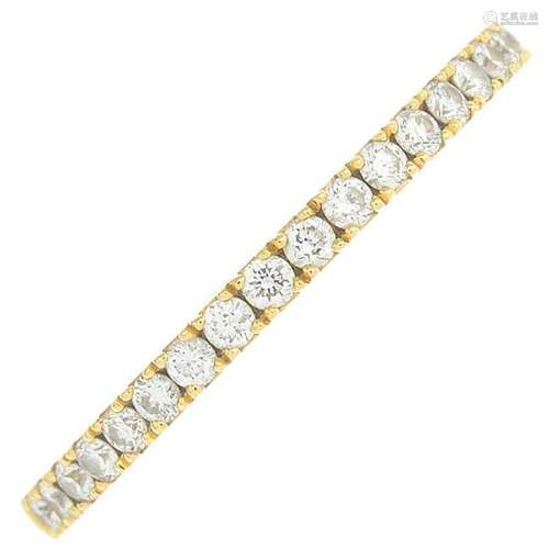 An 18ct gold diamond half eternity ring, by De Beers.