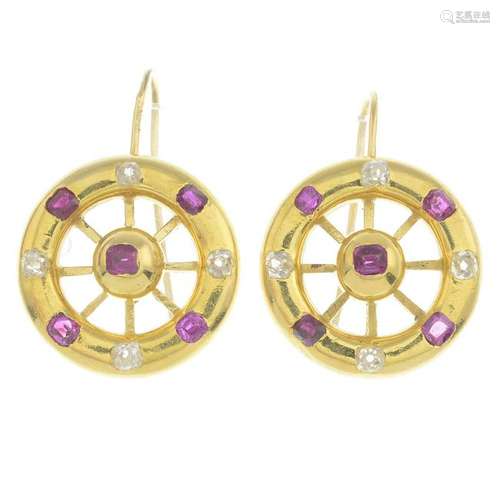 A pair of 18ct gold ruby and diamond earrings.Estimated