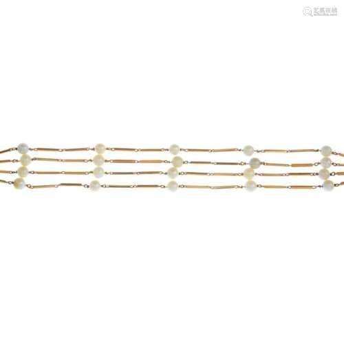 An 18ct gold cultured pearl multi-row bracelet. Length