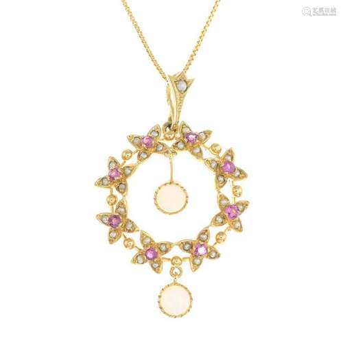 A 9ct gold pendant, set with opals, rubies and split