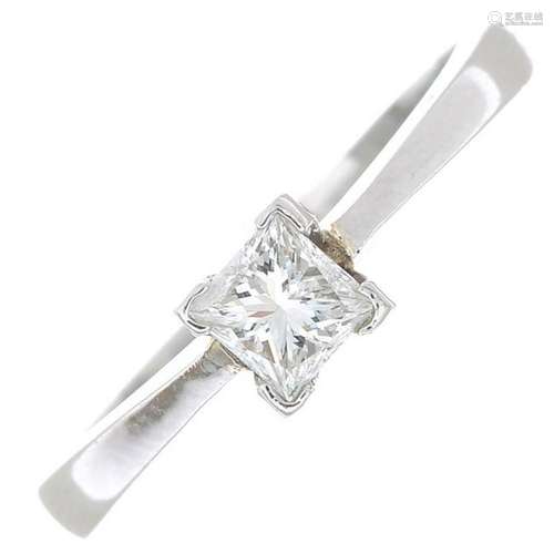 A platinum square-shape diamond single-stone ring.