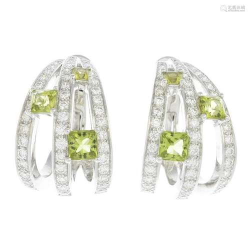 A pair of 18ct gold diamond and peridot hoop earrings.