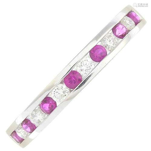 An 18ct gold ruby and diamond half eternity