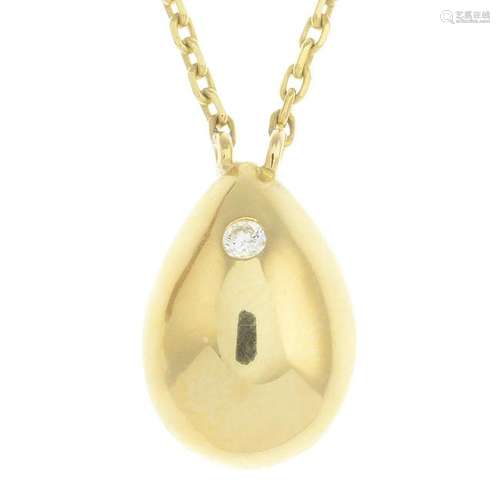 An 18ct gold diamond pendant, suspended from a