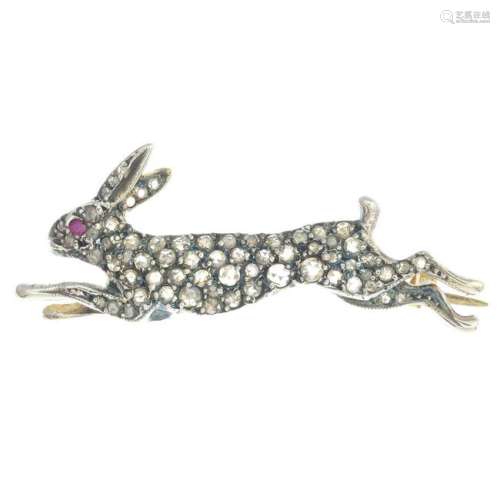 A ruby and diamond hare brooch.Length 4.2cms.