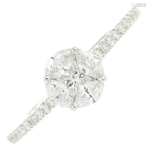 A diamond cluster ring.Total diamond weight 0.54ct.