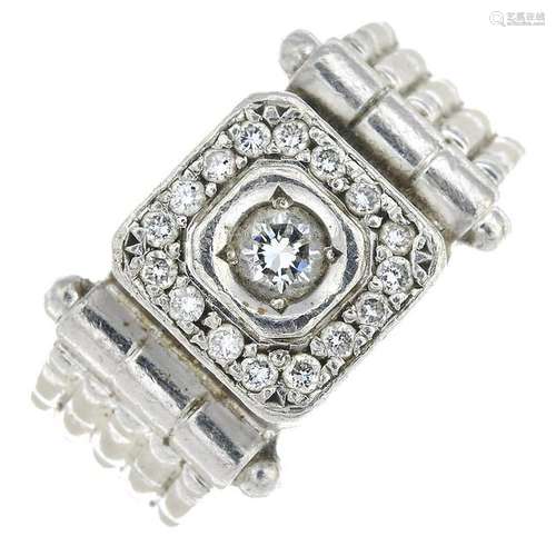 A platinum diamond cluster ring.Total diamond weight