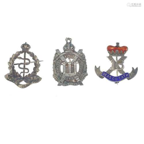 A selection of twelve silver and white metal regimental