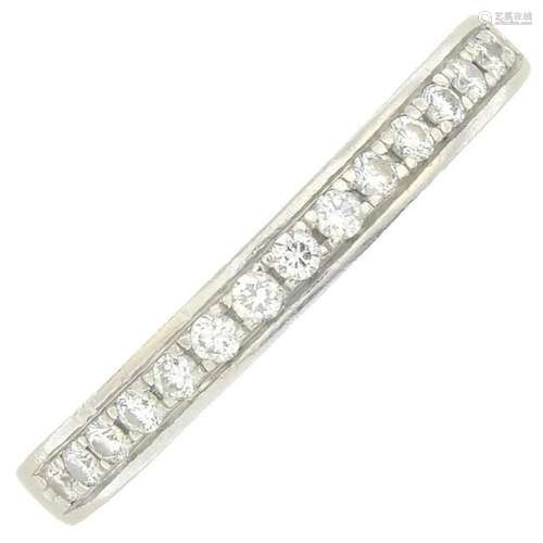 A platinum diamond half eternity ring.Estimated total